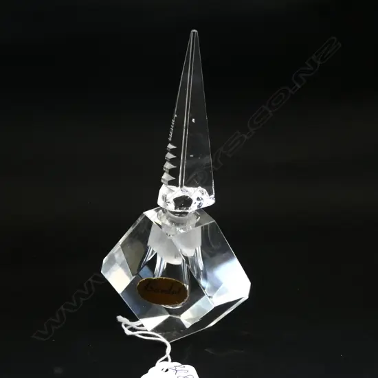 A vintage glass perfume bottle